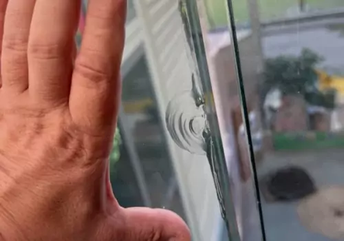 impact-damage-shelled-glass-on-glass-balustrade-panel